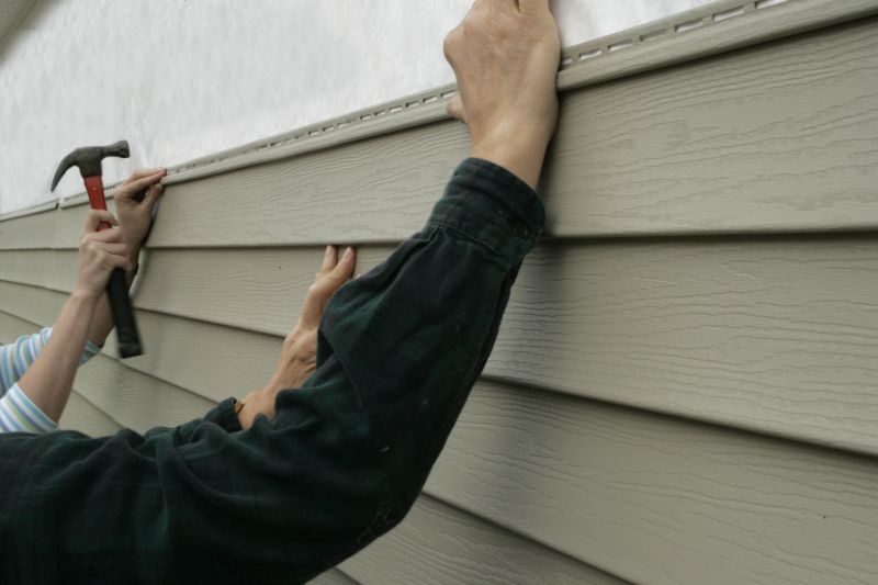 Securing Vinyl Siding to the Structure